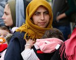 Flüchtlinge am 19. Oktober 2015 im Transitlager nahe dem griechischen Idomeni an der mazedonischen Grenze. Bild: Frauen mit Kindern.